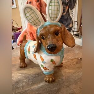 Easter dachshund bunny from blue sky “dashing in carrots” is dressed to impress